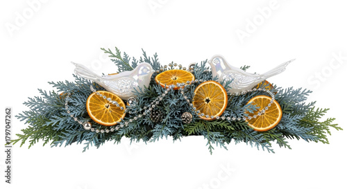 Photos Isolated evergreen centerpiece with dried orange slices and ceramic birds for th