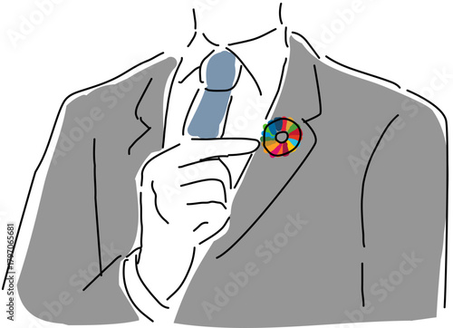 SDGsバッジを指差すビジネスマン