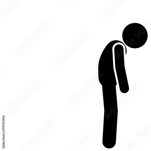 Person grieving while leaning head on wall
