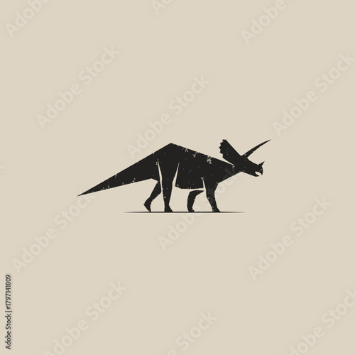 Stylized dark silhouette of a Triceratops dinosaur on a neutral background, prehistoric animal graphic icon and symbol.
