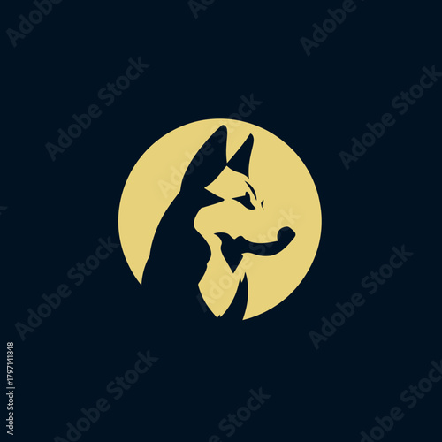 Minimalist Wolf or Fox Head Silhouette Against Golden Moon Graphic Design