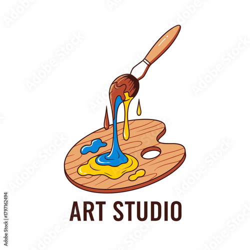A paintbrush drips blue and yellow paint onto a wooden palette. Text "ART STUDIO" is shown below