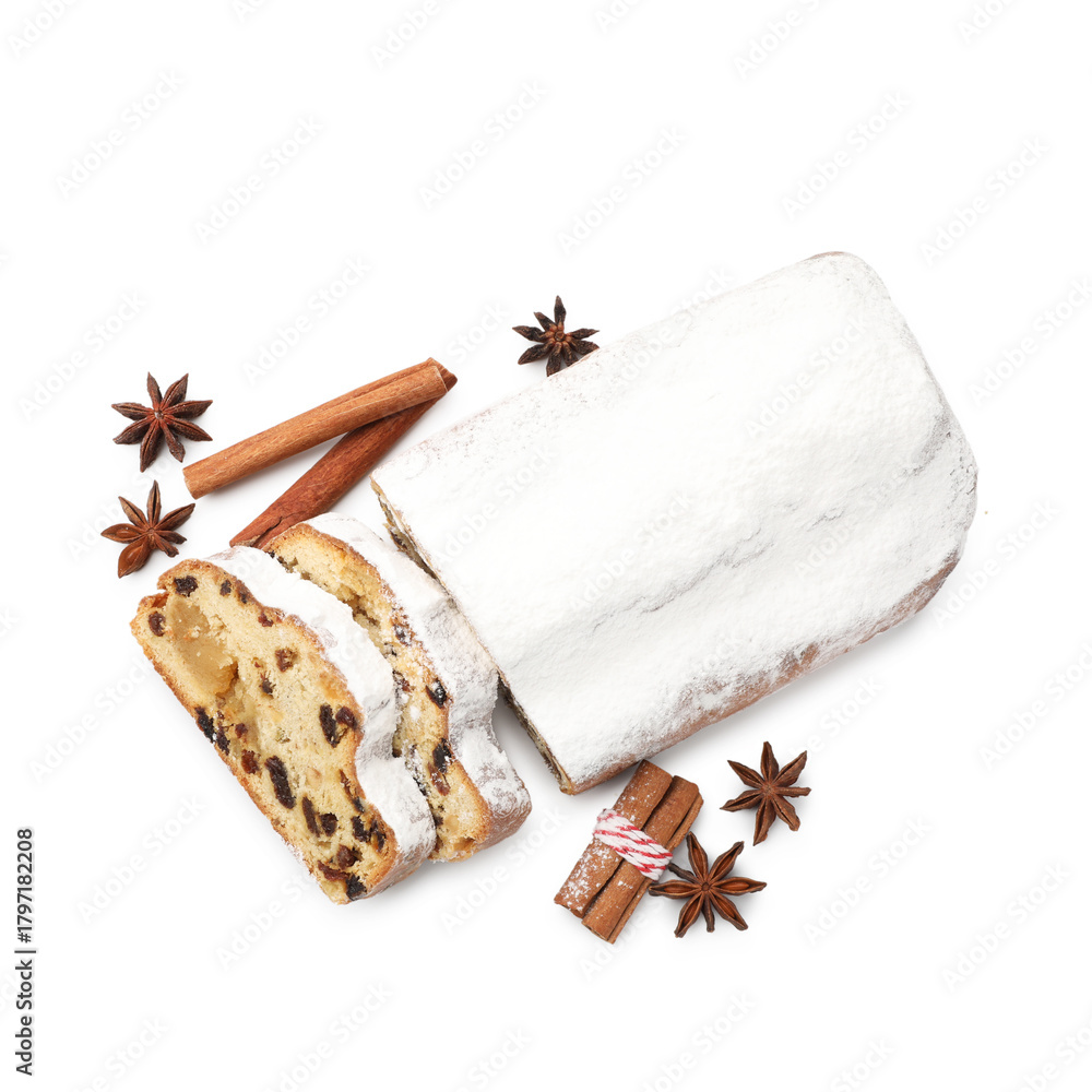 Naklejka premium Traditional Christmas Stollen with icing sugar and spices isolated on white, top view