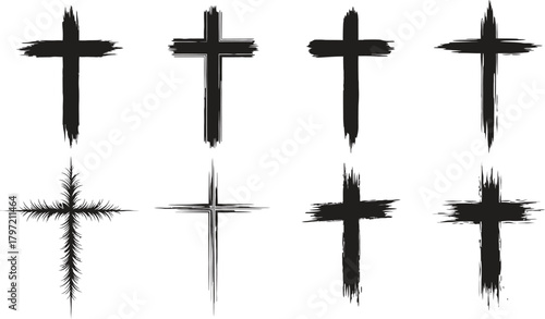 Collection of eight grunge style christian cross icons with brush stroke textures on white background