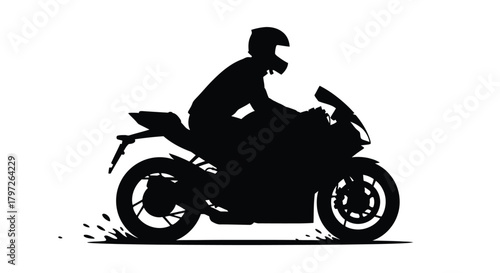 Silhouette of a motorcyclist speeding intensely on a sport bike