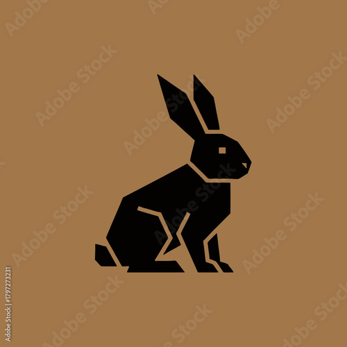 Geometric black rabbit silhouette on a brown background, stylized and modern.