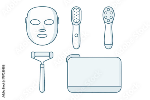 Collection of modern electronic skincare tools including LED light therapy mask and facial massagers