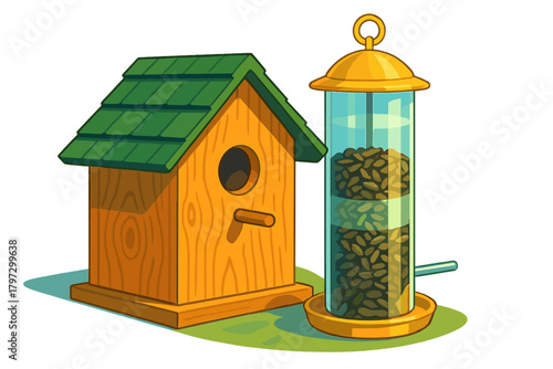 Wooden birdhouse with green roof next to a clear cylindrical bird feeder filled with seeds