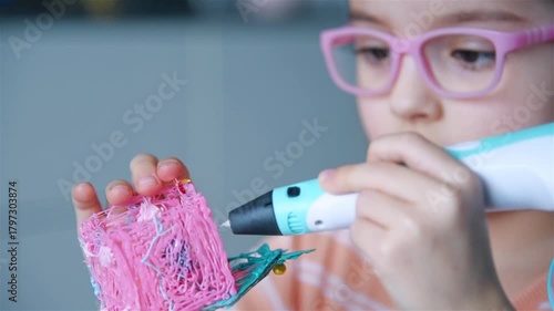 Girl with 3D pen making plastic 3d toy. Concept of сreative, technology, leisure and education. Close up