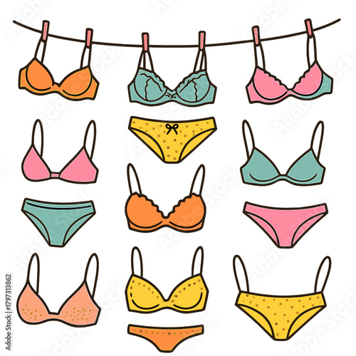 Collection of colorful bras and panties hanging on a clothesline for laundry