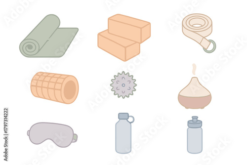 Essential yoga and fitness accessories set including mat, blocks, roller, and diffuser