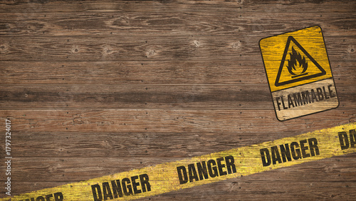 Wooden background with flammable sign and danger tape