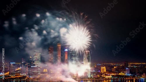 Spectacular Fireworks Display Over Modern City Skyline at Night.