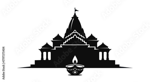 Silhouette of a Traditional Indian Temple with Diya.
