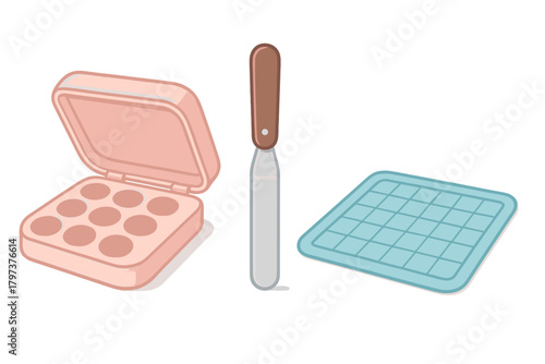 Essential kitchen supplies for baking and confectionery work, including silicone molds, spatulas, and mats