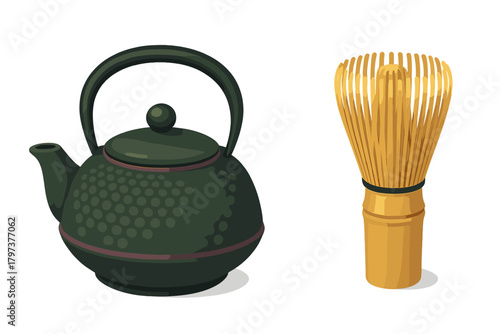 Dark green tetsubin teapot and golden bamboo chasen whisk used for preparing matcha tea