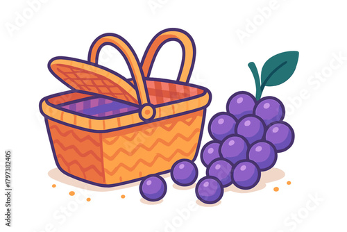 Wicker picnic basket with open lid next to ripe purple grapes and scattered berries