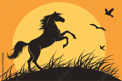 Dynamic Silhouette of a Powerful Wild Horse Rearing on a Grassy Hill, Symbolizing Freedom and Strength Against a Vivid Orange Sunset Sky with Flying Birds