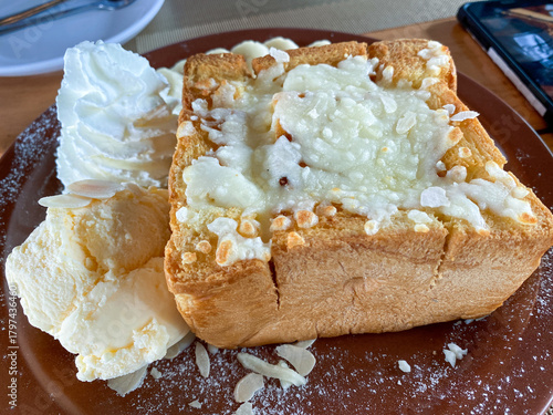 Delicious Honey Toast with Ice Cream and Creamy Toppings