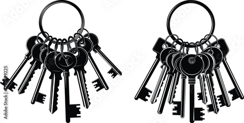 Assortment of classic metal house keys hanging from a large circular key ring