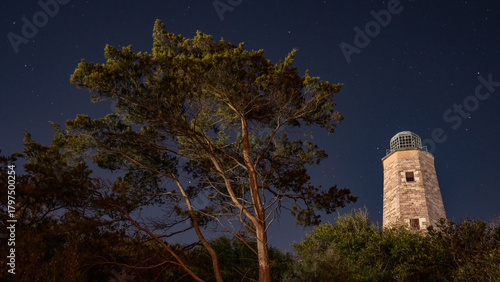 Cape Henry Lighthouse in Fort Story Virginia at night.  Both the old and new lighthouse.