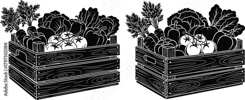 Freshly harvested garden vegetables, including carrots, tomatoes, and leafy greens, piled in a rustic wooden crate