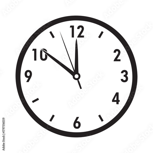 Black and white analog clock face showing approximately 1055