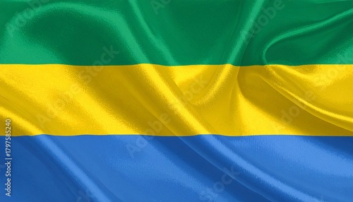 Gabonese national flag with green, yellow, and blue horizontal stripes on wavy textured fabric