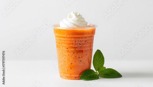 Smoothie topped with whippe...