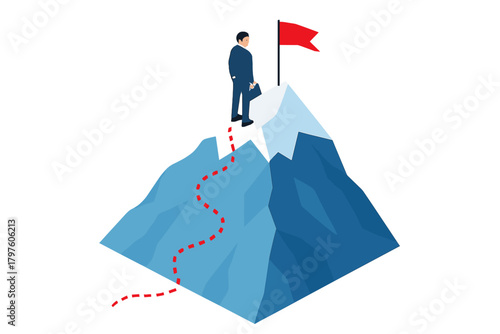 Businessman standing on the mountain peak after climbing a difficult path to reach the goal flag