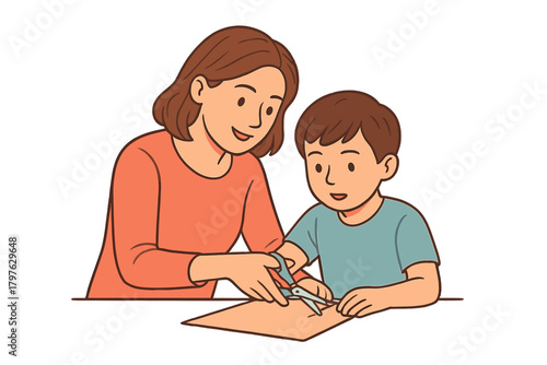 Mother guiding young son learning to safely use scissors while cutting paper for a craft project