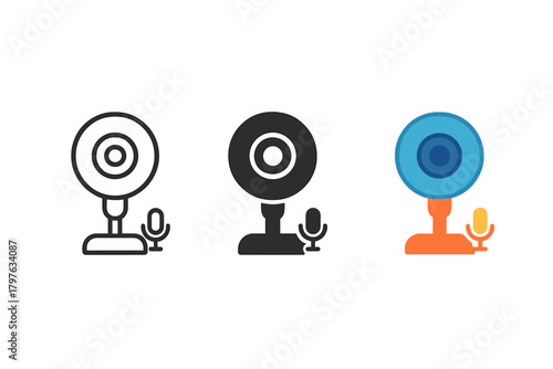 Camera with a microphone and a microphone stand. The camera is black and white and the microphone is orange