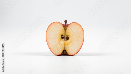 Sliced red apple against a ...