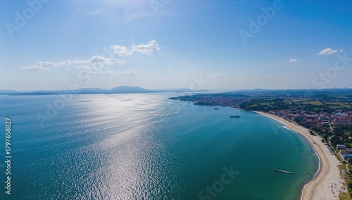 Fototapeta Naklejka Na Ścianę i Meble -  Aerial view of a coastal town with residential buildings, urban density,