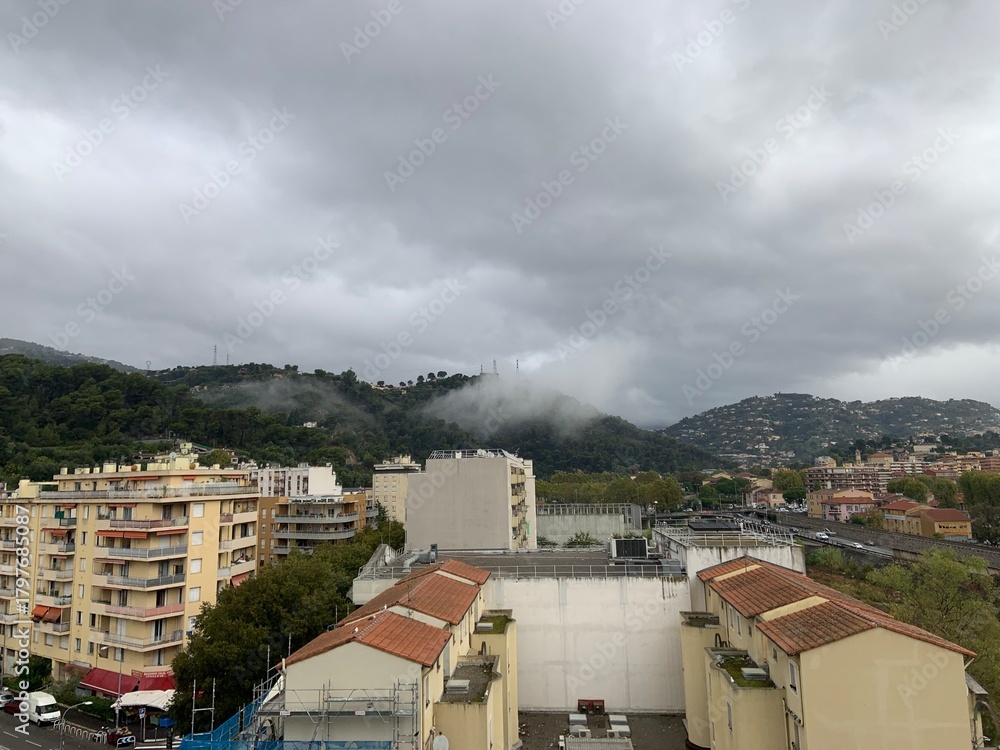 Obraz premium Colorful Villagescape with Mountain Vista