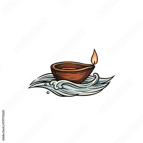Earthen lamp (Diya) floating on waves with a tiny flame for Ganga Sagar Mela  