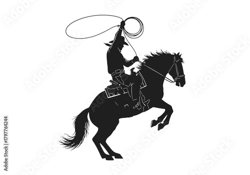 A silhouetted cowboy riding a horse with a lasso spinning