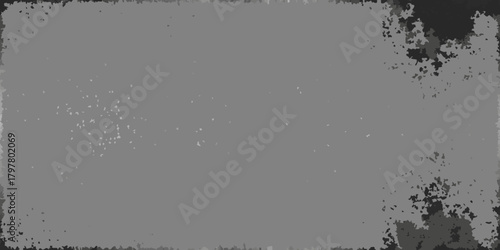 Monochromatic textured background with distressed edges and scattered light speckles
