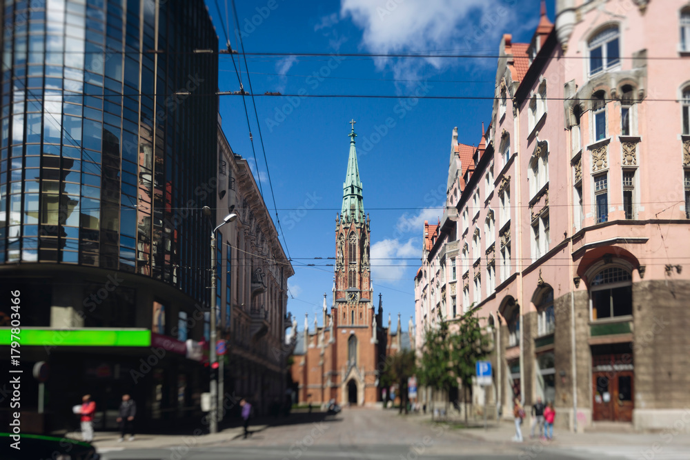 Naklejka premium Riga Old Town view, Latvia, streets of Vecriga historical center with Town Hall square, House Of The Black Heads, Cathedral and church, travel to Latvia and Baltic States, summer day with a blue sky