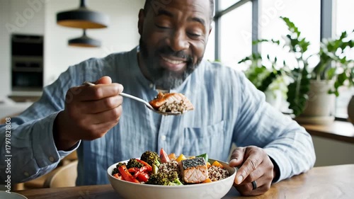 Happy Man Eating Healthy Salmon Bowl, Enjoying Meal