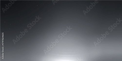 Dark blue background with a spotlight on a brushed metallic gray texture