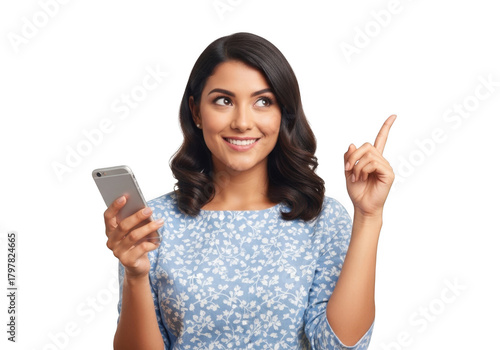 Smiling young woman holding a smartphone and pointing upwards with her index finger isolated on transparent background
