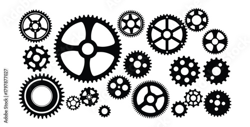 Assorted gears and cogs in black and white create a mechanical engineering background 87