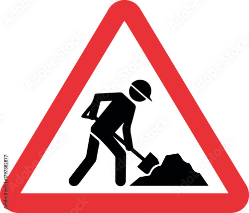 Red triangular warning sign depicting a person digging with a shovel, indicating road construction ahead