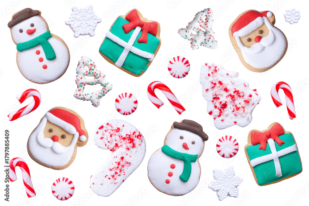 Obraz premium Assortment of colorful Christmas cookies and sweets. Above view. Unique items isolated on a transparent background. Holiday baking concept.