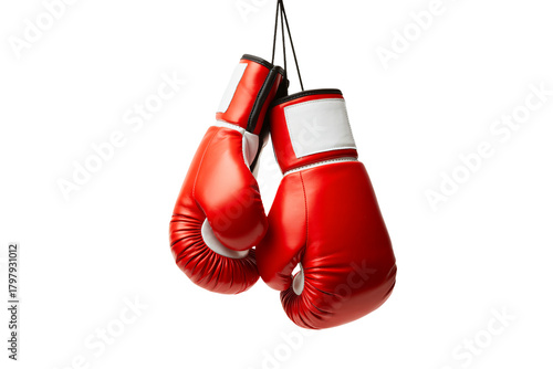 Dynamic red boxing gloves hang ready for action, symbolizing strength, competition, and the pursuit of victory.
