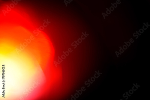 Spectacular intense red-to-yellow bokeh sphere with brilliant white luminous core creating powerful three-dimensional bokeh effect and vibrant warm saturation. Authentic film photography artifact show