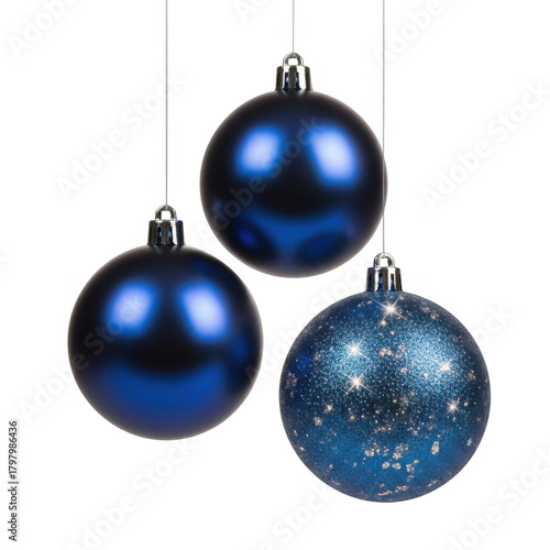 three blue ornaments hanging on strings on transparent background