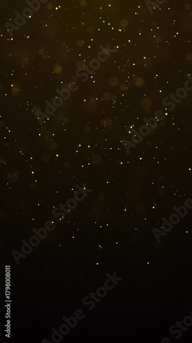 Golden glitter particles background with shining neon dust going up and light flare or glare overlay effect above for luxury premium product design or award template backdrop Magical radiance loop