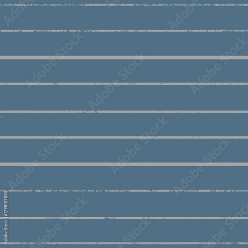 A close up of a blue wall with white lines running horizontally across the entire surface area view